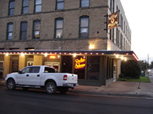 The Rodeo Exchange building on Exchange Avenue in 2004 with the neon lit